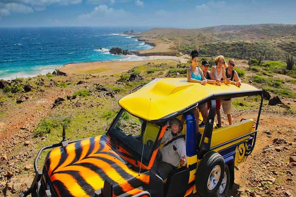 Off-road Jeep and UTV tour exploring rugged terrain in Aruba